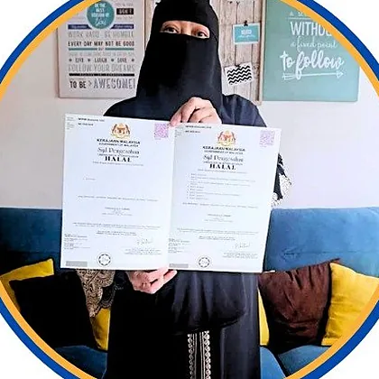 Two halal certificates held up by Perniagaan Alaf Purnama