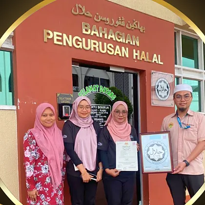 The DJJ Food Industry team with their certificate outside JAKIM's Bahagian Pengurusan Halal